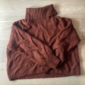 Pumpkin colored high neck sweater